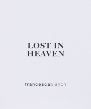 Front minimalistycznego opakowania perfum Francesca Bianchi Lost In Heaven, z centralnym napisem 'LOST IN HEAVEN'.