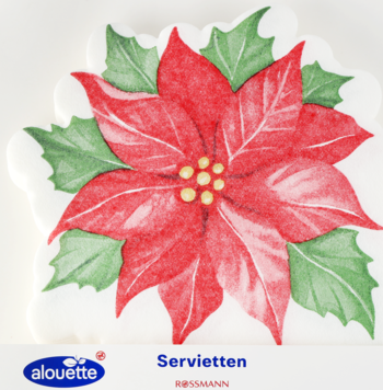 Widok z góry na papierowe serwetki Alouette w kształcie Gwiazdy Betlejemskiej, czerwone z zielonymi liśćmi.