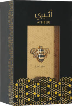 Atheeri by Lattafa, orientalny zapach damski. Czarno-złote pudełko z motywem plastra miodu i złotą pszczołą, widok z przodu pod kątem.