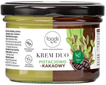 Słoik Foods by Ann Krem Duo Pistacjowo-Kakaoowy, podwójny krem w szklanym słoiku z czarną nakrętką, widok z przodu.