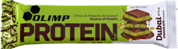 Olimp Protein Baton Dubai Chocolate 40g, zielona folia z grafiką czekolady, pistacji; widok z przodu.