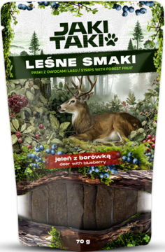 JAKITAKI Leśne Smaki jeleń z borówką, przysmaki dla psa, zielone opakowanie z jeleniem na tle lasu.