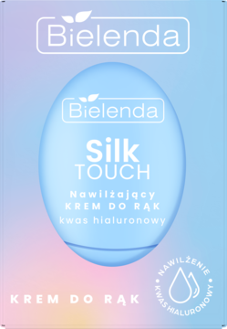 Opakowanie Bielenda Silk Touch nawilżający krem do rąk z kwasem hialuronowym, pastelowe tło z niebieskim owalem.