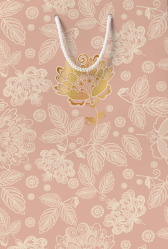 Elegancka torebka prezentowa na kosmetyki, brzoskwiniowa ze złotymi, lśniącymi wzorami i białymi sznurkami.