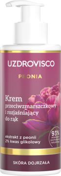 Krem do rąk UZDROVISCO PEONIA przeciwzmarszczkowy i rozjaśniający w ciemnoróżowej butelce z pompką.