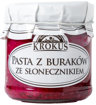 Krokus pasta z buraków ze słonecznikiem w szklanym słoiku, widok z przodu, intensywny purpurowy kolor.