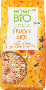 Pomarańczowo-żółta torebka musli enerBiO Frucht Kick, z widocznym okienkiem na płatki i owocowe dodatki.