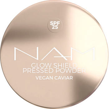 NAM Glow Shield Pressed Powder SPF 25, okrągły puder w beżowo-złotym kompakcie z wegańskim kawiorem, widok z góry.