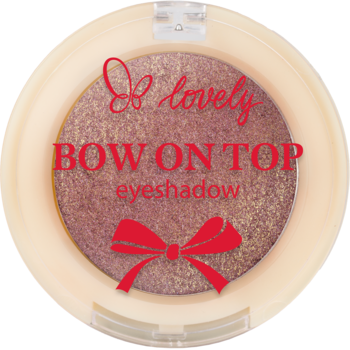 Cień So Lovely Bow on Top, metaliczny brązowo-fioletowy w okrągłym beżowym opakowaniu. Widok z góry.