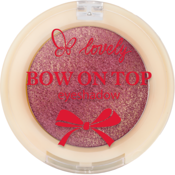 Różowy, brokatowy cień do powiek BOW ON TOP w otwartym, kremowym, okrągłym opakowaniu z kokardką.