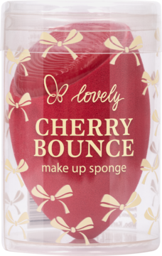 Gąbka Lovely Cherry Bounce do makijażu w przezroczystym opakowaniu, czerwona z kokardami, zapewnia naturalne wykończenie.