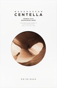 Białe opakowanie SKIN1004 Madagascar Centella Probio-Cica Nourishing Mask z grafiką beżowego kanionu.