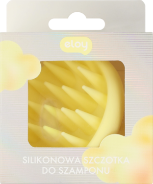 Żółta silikonowa szczoteczka do szamponu etay z miękkimi wypustkami, w białym pudełku z okienkiem, widok z przodu.
