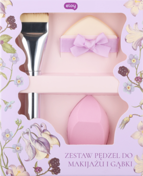 Zestaw Eloy w fioletowym pudełku: srebrny pędzel, kremowa gąbka z kokardą i różowa gąbka do makijażu.