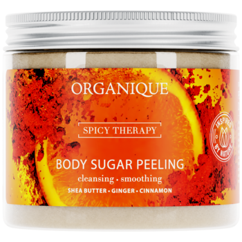 Organique Spicy Therapy Body Sugar Peeling z pomarańczą, imbirem, cynamonem w słoiku, widok z przodu.