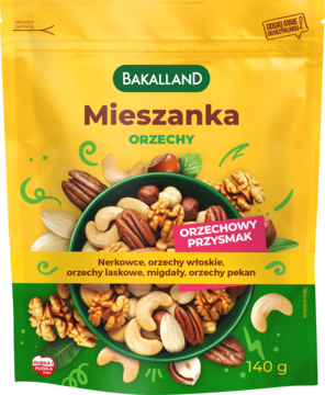 Żółto-zielone opakowanie Bakalland Mieszanka Orzechy 140g, front z miską nerkowców, włoskich, laskowych, migdałów i pekanów.
