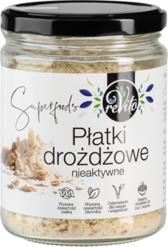 Płatki drożdżowe nieaktywne Superfoods reVito w szklanym słoiku, widok z przodu, biała etykieta, czarne wieczko.
