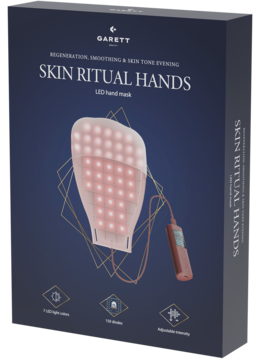 Ciemne pudełko Garett Beauty Skin Ritual Hands, maska LED do rąk, z grafiką różowego urządzenia i złotych linii.