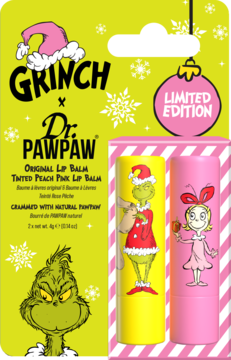 Zestaw Grinch x Dr. PAWPAW: dwa balsamy, żółty Original i różowy Tinted Peach Pink, na świątecznym zielonym tle.