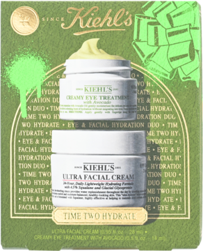 Zestaw Kiehl's Time Two Hydrate z kremem pod oczy z awokado i kremem do twarzy, na zielonym tle, widok frontalny.