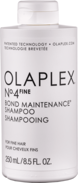 Biała plastikowa butelka szamponu Olaplex No.4 Fine Bond Maintenance do włosów cienkich, widok z przodu.