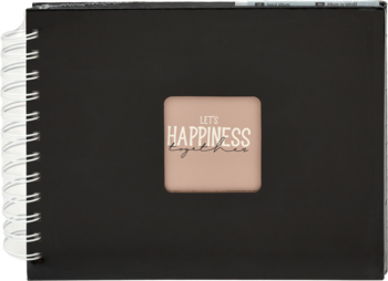 Czarny notatnik spiralny z białymi sprężynami. Na okładce beżowa etykieta z napisem 'LET'S HAPPINESS together'.