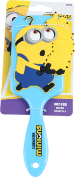 Niebieska szczotka do włosów Minions z żółtym Minionkiem w niebieskich ogrodniczkach, trzymającym żółte włosy, w opakowaniu.