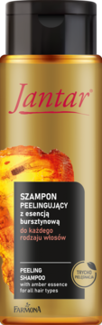 Złota butelka Jantar Peeling Shampoo z esencją bursztynową, czarna etykieta, widok z przodu.