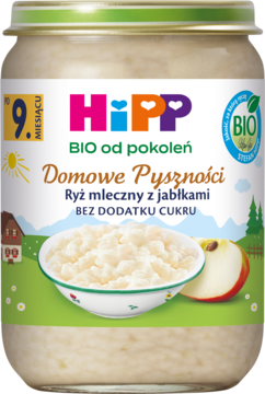 Słoiczek HiPP BIO Ryż mleczny z jabłkami, dla niemowląt po 9. miesiącu, z miseczką kaszki na etykiecie.