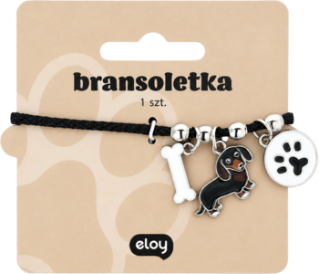Eloy Bransoletka pies z czarnym sznurkiem i zawieszkami: kość, jamnik i łapka, na beżowym kartoniku.