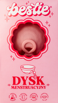 Różowy dysk menstruacyjny Bestie w kartonowym opakowaniu, z widocznym różowym dyskiem o falistym brzegu.