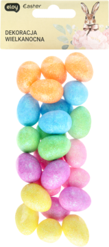 Eloy Easter, Dekoracja Wielkanocna: brokatowe jajka styropianowe w pastelowych kolorach, ułożone w piramidę.