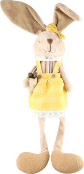 Beżowy pluszowy królik w żółtej sukience w kratkę z białą koronką i żółtą kokardą na uchu, stoi.