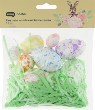 Zestaw 12 nakrapianych jajek wielkanocnych w pastelowych kolorach z zieloną trawką w przezroczystej torebce. Widok z przodu.