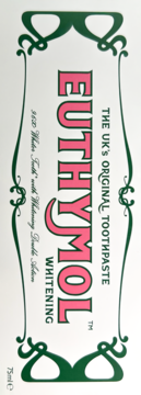Euthymol Whitening Toothpaste label, white with ornate green border, pink brand name, front view.