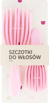 Opakowanie Eloy z dwoma różowymi szczotkami do włosów: wentylowaną z kropkami i owalną.