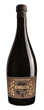 Butelka Kombucha by Laurent z fermentowanej herbaty, smak Oak & White Grapes, brązowa etykieta z złotym drzewem.
