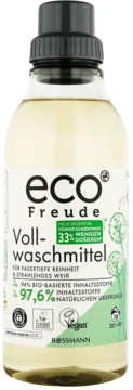Biało-zielona butelka eco Freude Vollwaschmittel, 33% mniej dozowania, 97,6% naturalne składniki, widok z przodu.