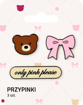 Eloy zestaw 3 pinów "pink please": brązowy miś, różowa kokarda, owalny pin z napisem. Widok z góry.