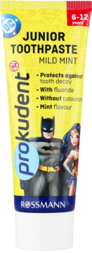 Żółta tubka pasty do zębów prokudent Junior Mild Mint z Batmanem i Wonder Woman, widok z przodu, dla dzieci 6-12 lat.