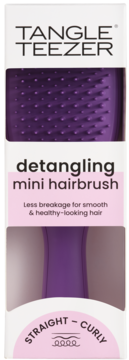 Front view of purple Tangle Teezer detangling mini hairbrush in white & pink packaging, ideal for straight & curly hair.