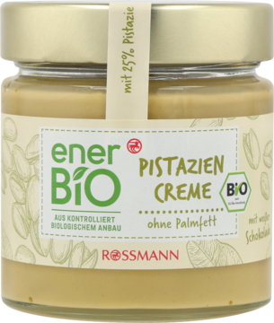 enerBiO Pistazien Creme Rossmann: Słoik jasnozielonego kremu bio z 25% pistacji, bez oleju palmowego, widok z przodu.