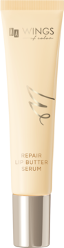 Beżowy AA Wings of Color Repair Lip Butter Serum Vanilla Shimmer, tubka z metalowym aplikatorem, widok z przodu.