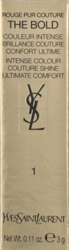 Złoto-beżowe pudełko szminki Yves Saint Laurent The Bold Rouge Pur Couture, z czarnym logo YSL i numerem 1.