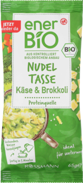Zielone opakowanie enerBiO Nudel Tasse Käse & Brokkoli 65g, z ilustracją gotowego dania w rondlu, widok z przodu.