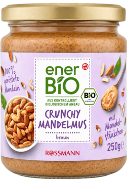 EnerBiO Crunchy Mandelmus, ekologiczny mus migdałowy z kawałkami, w słoiku 250g, fioletowa etykieta.