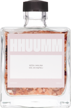 Hhuumm Róża i Malina sól do kąpieli w szklanej butelce z różowymi kryształkami i etykietą. Widok z przodu.