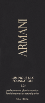 Front view of a dark ARMANI Luminous Silk Foundation 5.25 box with golden text, highlighting its natural glow.