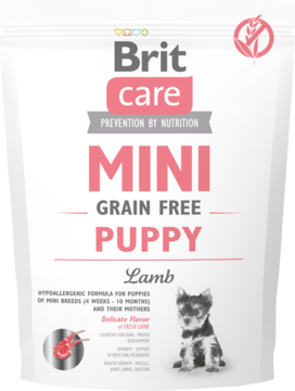 Frontalny widok białej karmy Brit Care Mini Grain Free Puppy Lamb, z różowym napisem i zdjęciem szczeniaka.