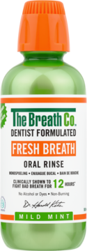 The Breath Co. Fresh Breath Oral Rinse, zielona butelka z pomarańczową nakrętką, Mild Mint, działa 12h, widok z przodu.